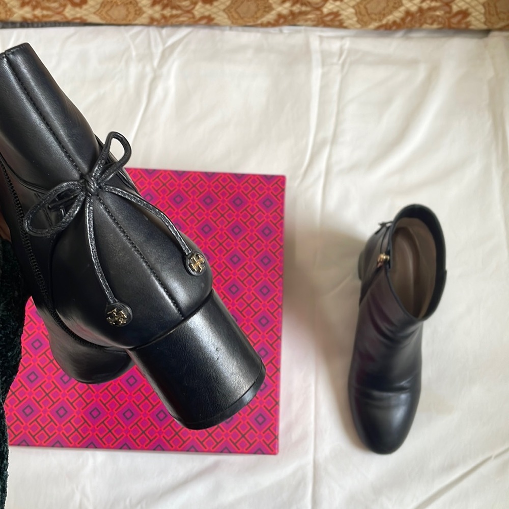 Tory Burch boots with bow on the back with gold Tory Burch logo
